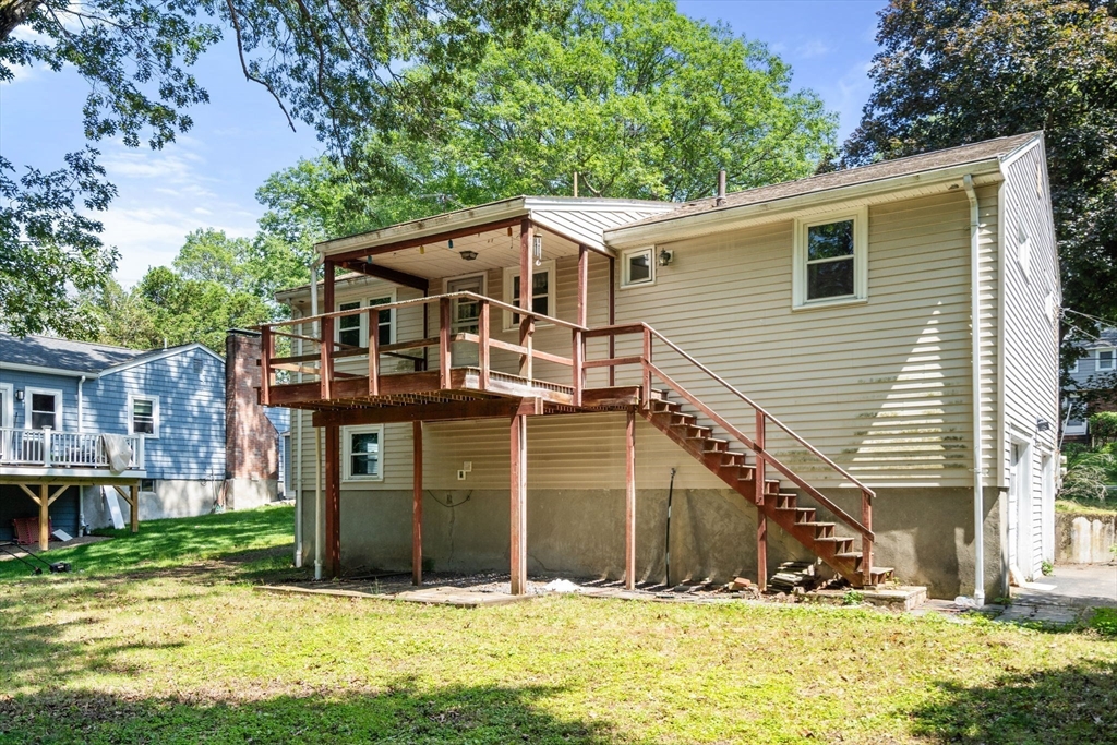 37 Freemont Street Lexington, MA 02421 - Photo 5 of 21 a view of a house with a yard