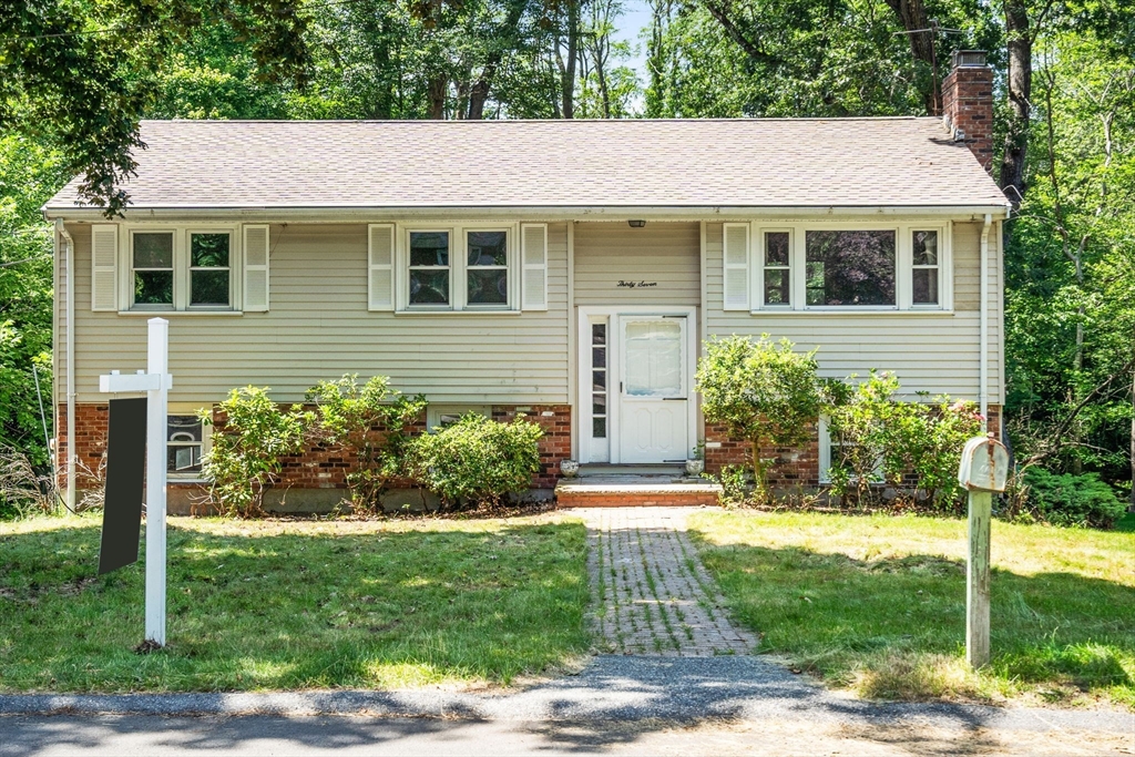 37 Freemont Street Lexington, MA 02421 - Photo 8 of 21 a front view of a house with a yard