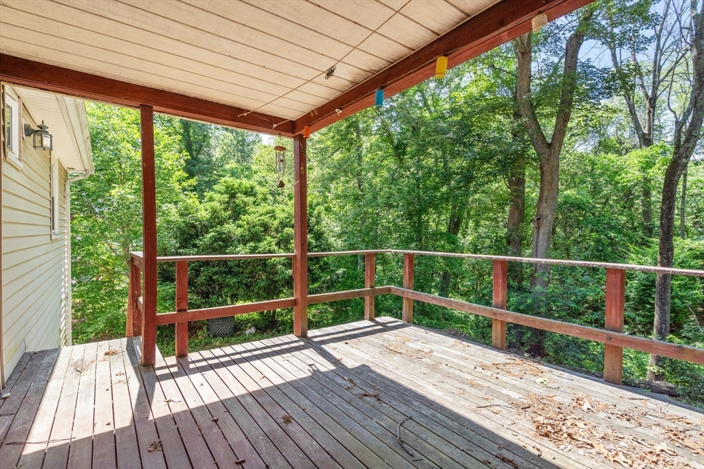 37 Freemont Street Lexington, MA 02421 - Photo 9 of 21 a view of a balcony with wooden floor