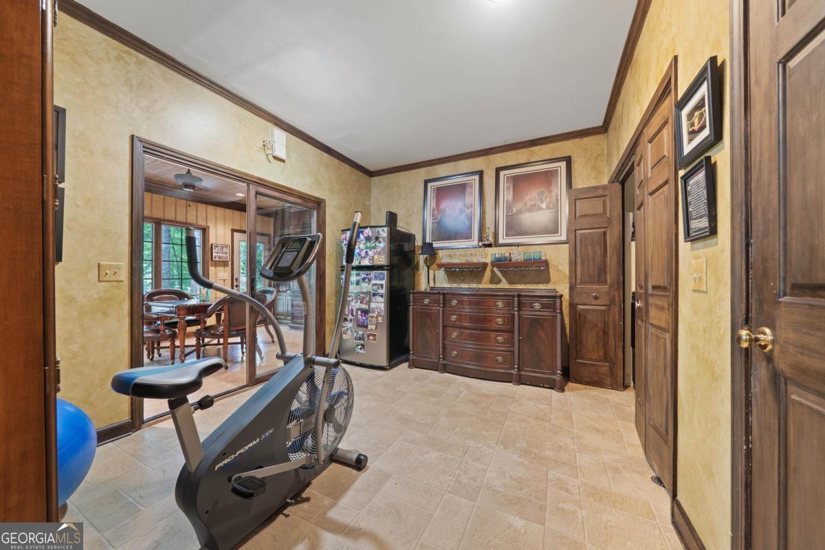 1031 Old Still Road Greensboro, GA 30642 - Photo 61 of 73 a view of a room with gym equipment
