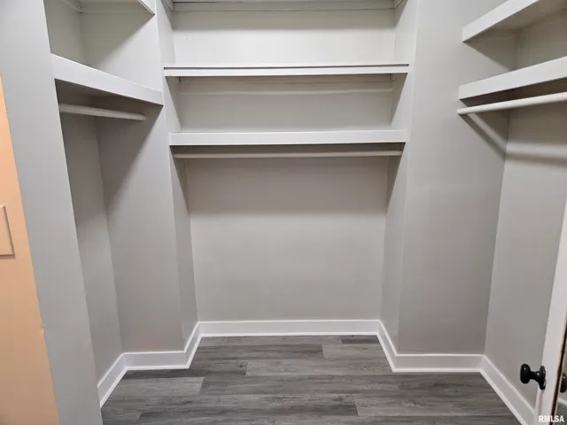 a view of an empty walk in closet