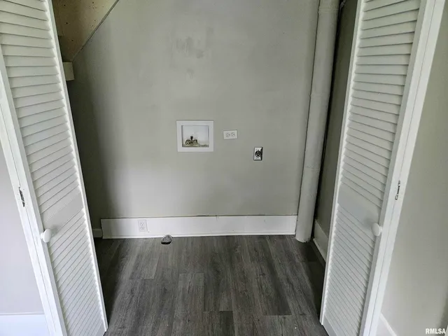 a view of wooden floor in an empty room