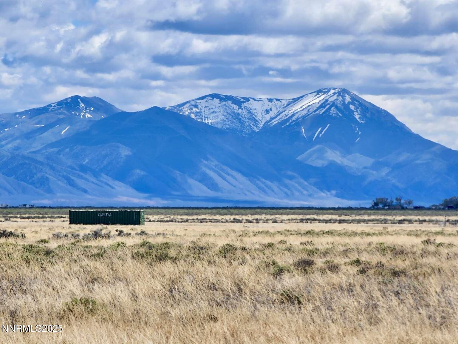 0 Crescent Ave Crescent Valley Crescent Valley, NV 89821 - Photo 20 of 23 a view of a dry yard with wooden fence