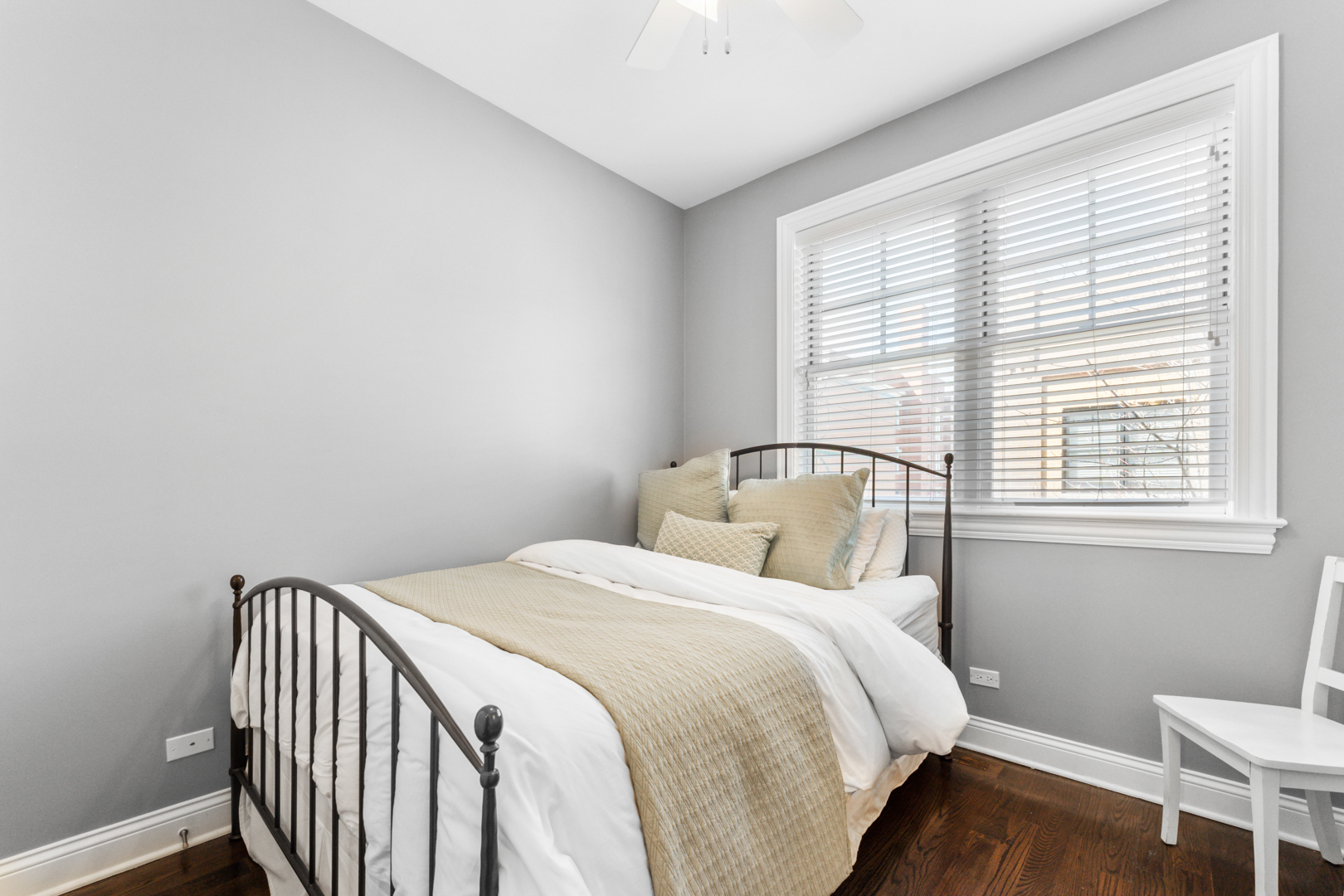 2060 North Stave Street, Unit 9 Chicago, IL 60647 - Photo 20 of 31 a bedroom with a bed and a window