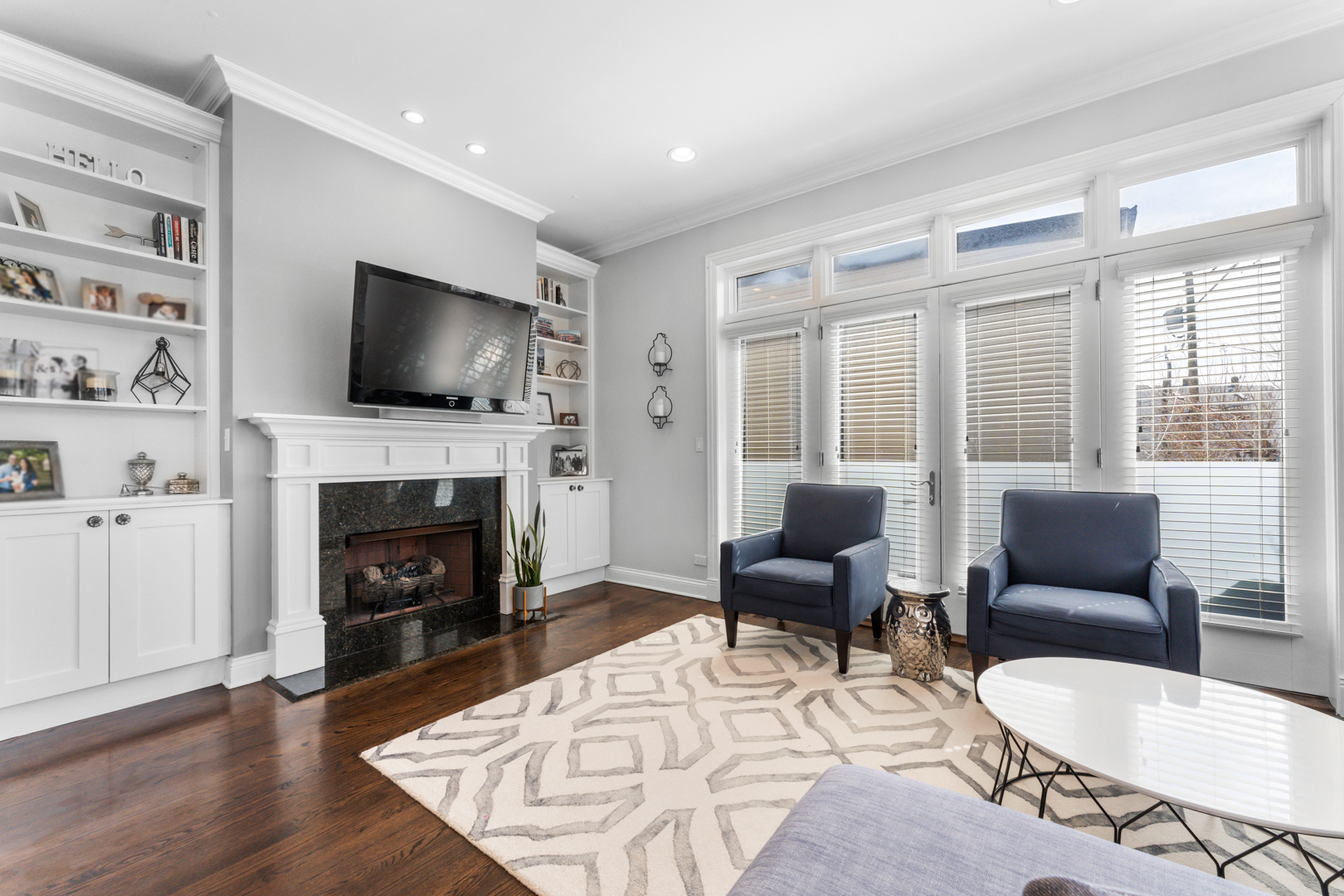 2060 North Stave Street, Unit 9 Chicago, IL 60647 - Photo 4 of 31 a living room with furniture a fireplace and a flat screen tv