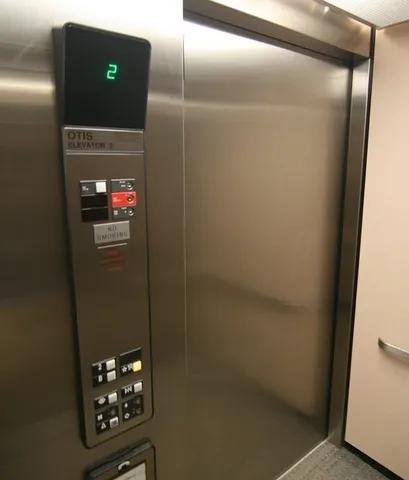 a view of elevator with hallway
