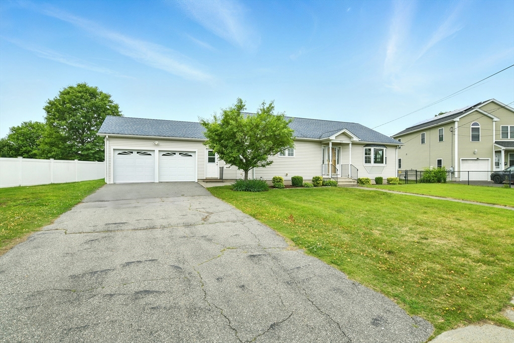 254 Island Pond Road Springfield, MA 01118 - Photo 1 of 26 a view of house with yard