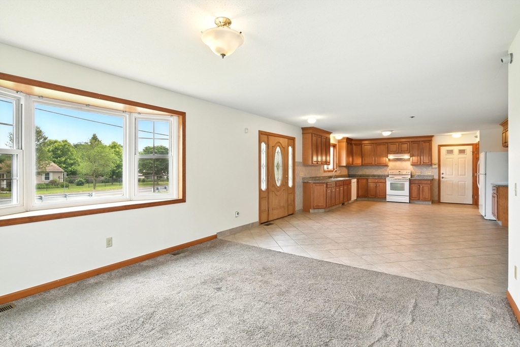 254 Island Pond Road Springfield, MA 01118 - Photo 11 of 26 a view of a kitchen with a sink and a window
