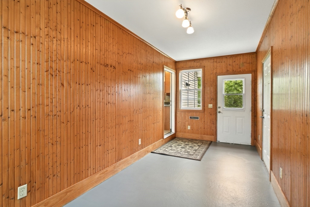 254 Island Pond Road Springfield, MA 01118 - Photo 20 of 26 a view of an empty room and a window