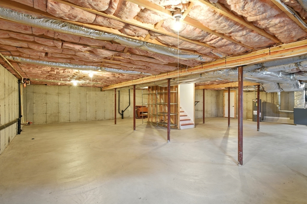 254 Island Pond Road Springfield, MA 01118 - Photo 21 of 26 a view of a room with wooden roof