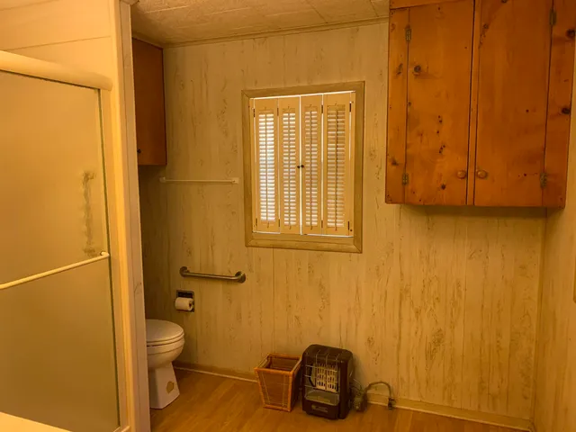 a bathroom with a toilet