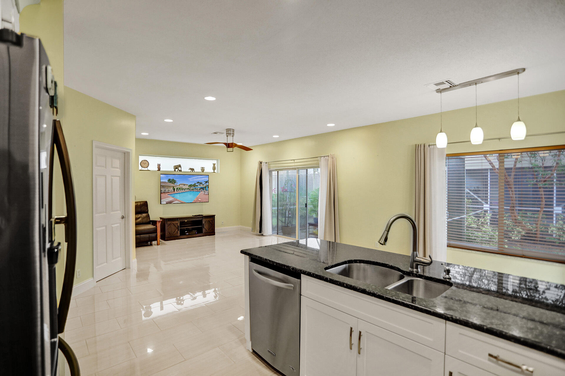 7214 Panache Way Boca Raton, FL 33433 - Photo 6 of 17 7214 panache way kitchen and family 2