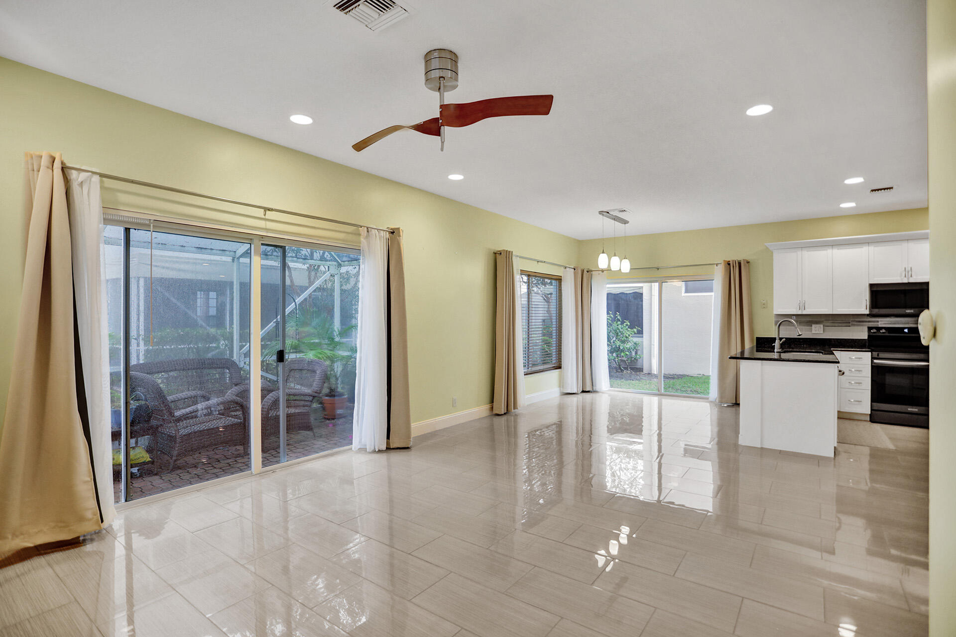 7214 Panache Way Boca Raton, FL 33433 - Photo 7 of 17 7214 panache way family kitchen and pati