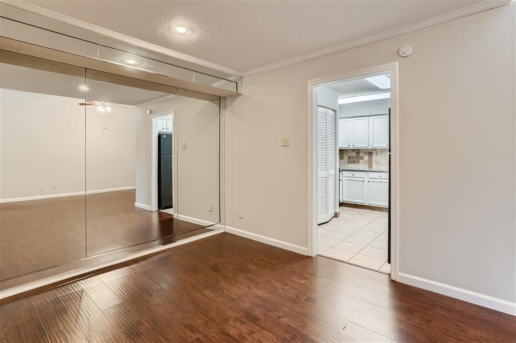 16301 Ledgemont Lane, Unit 269 Addison, TX 75001 - Photo 11 of 22 a view of entryway with wooden floor