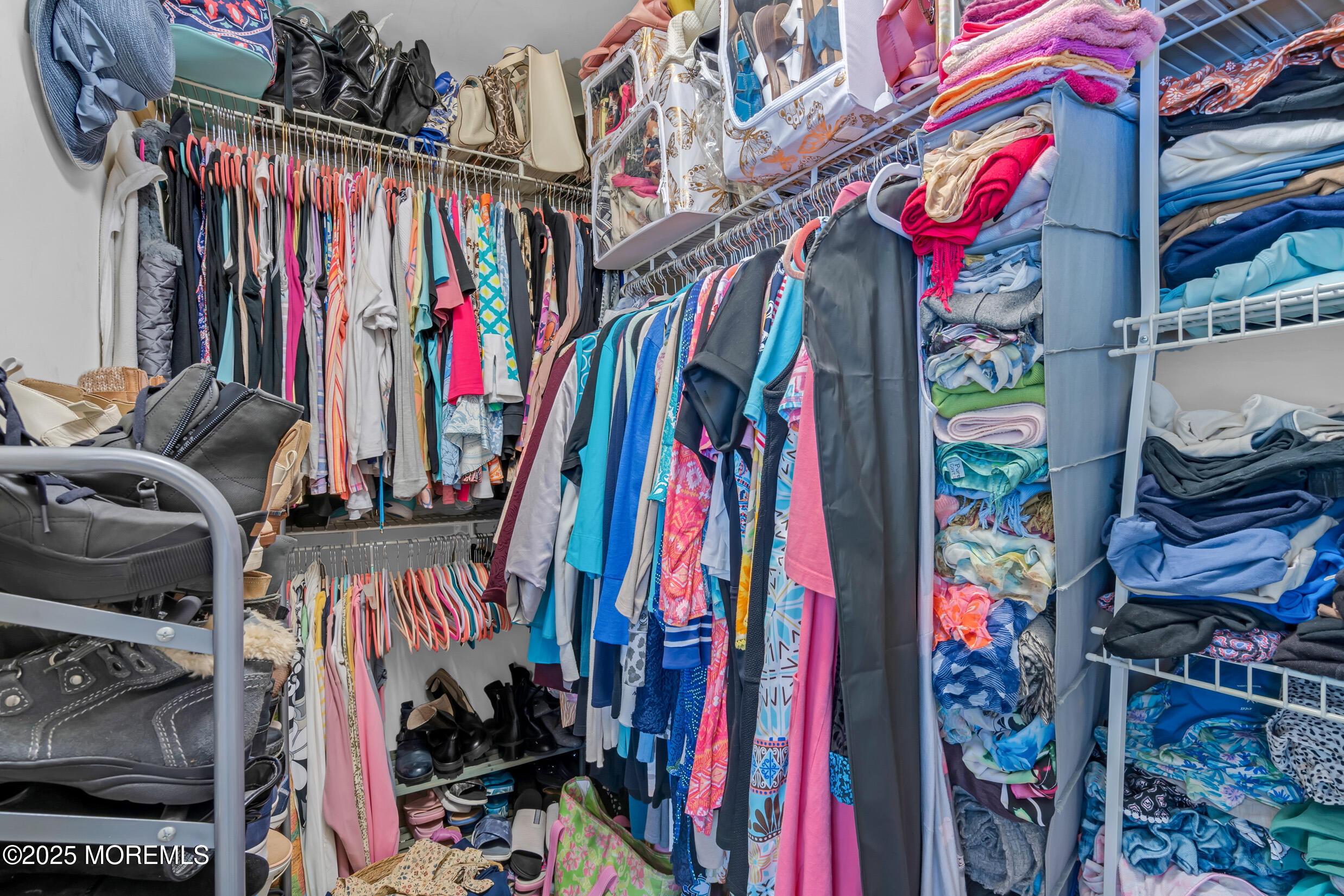 111 Spirit Way Brick, NJ 08723 - Photo 18 of 39 a view of walk in closet with clothes