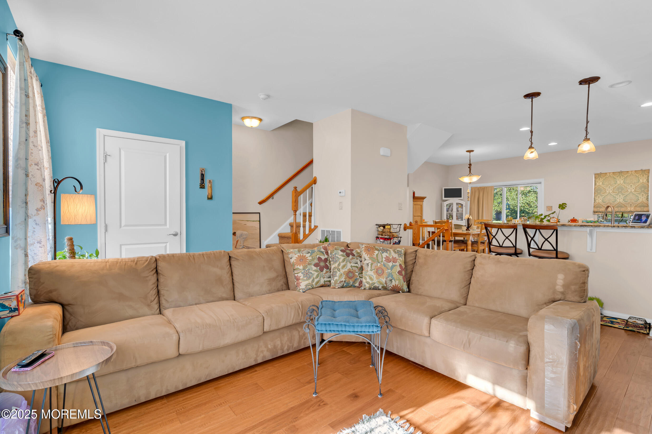 111 Spirit Way Brick, NJ 08723 - Photo 4 of 39 a living room with furniture and kitchen view