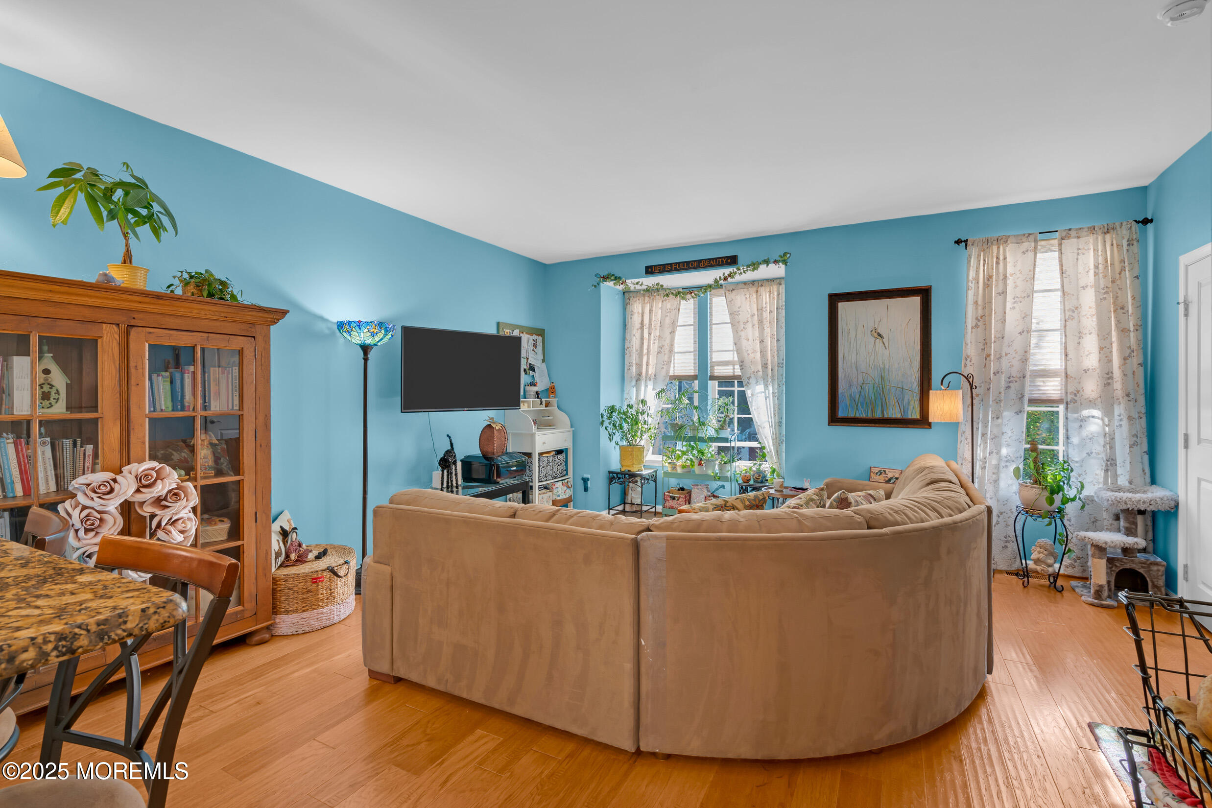 111 Spirit Way Brick, NJ 08723 - Photo 6 of 39 a living room with furniture and a flat screen tv