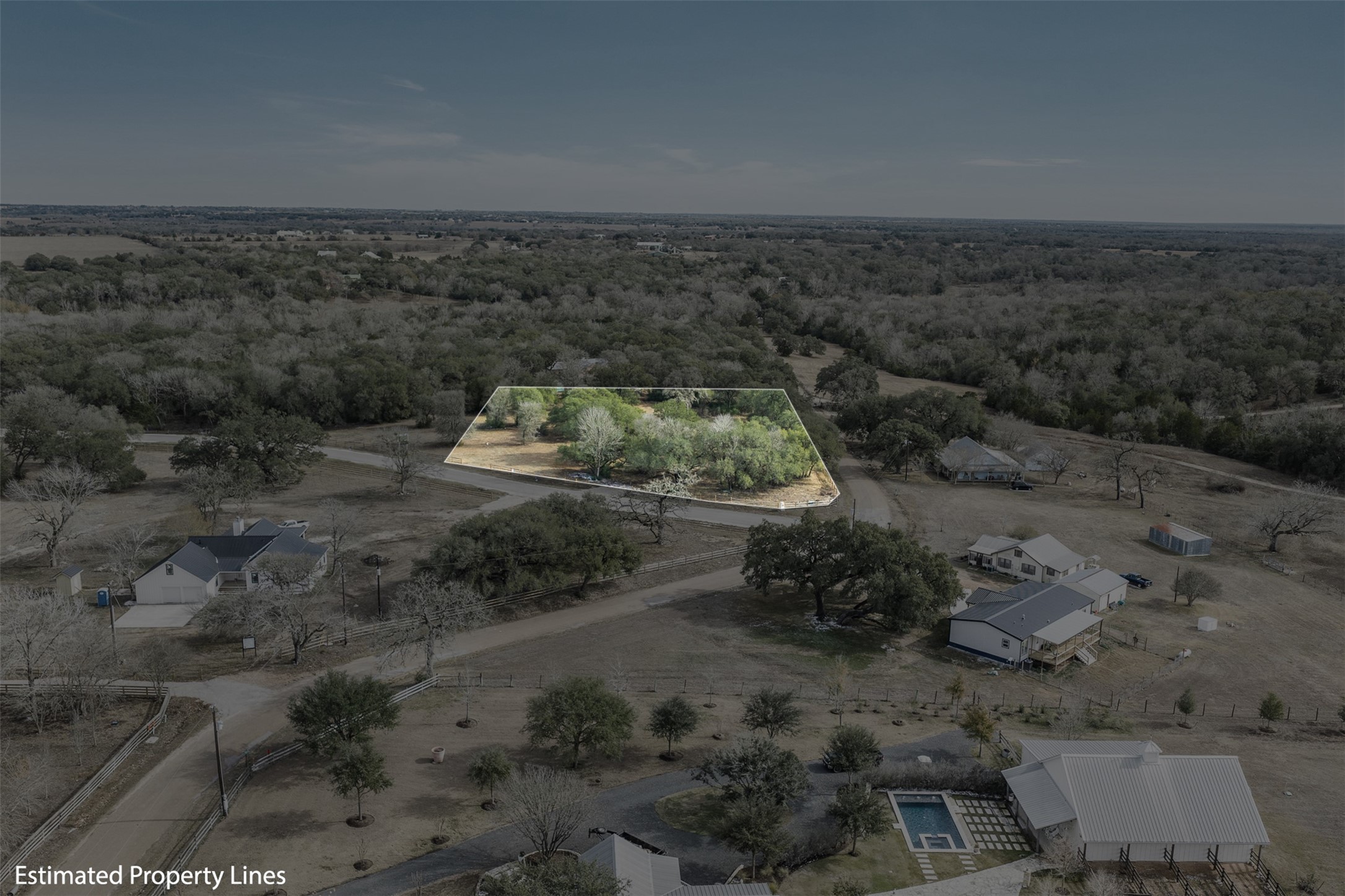 110 Drake Lane Round Top, TX 78954 - Photo 22 of 32 a view of a dry yard with trees