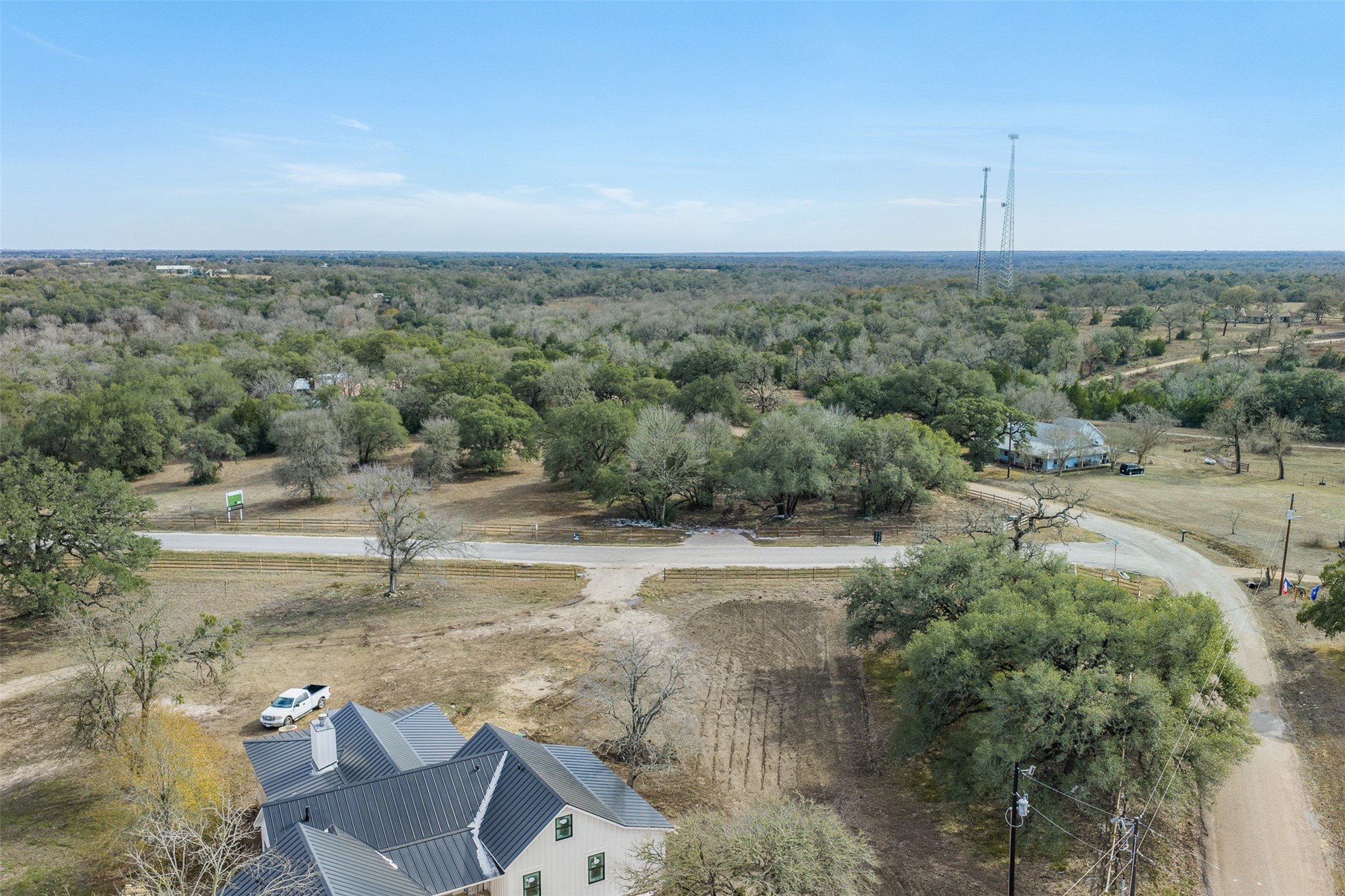 110 Drake Lane Round Top, TX 78954 - Photo 24 of 32 a view of a town with mountains in the background