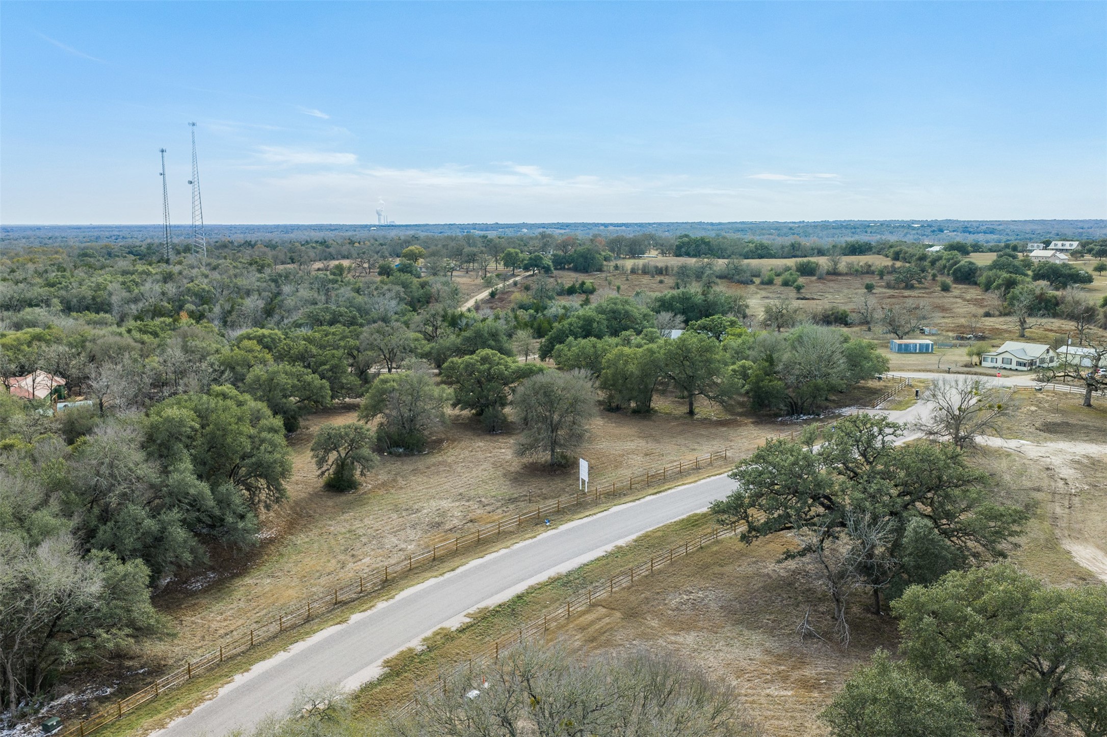 110 Drake Lane Round Top, TX 78954 - Photo 25 of 32 an aerial view of a houses with outdoor space and trees