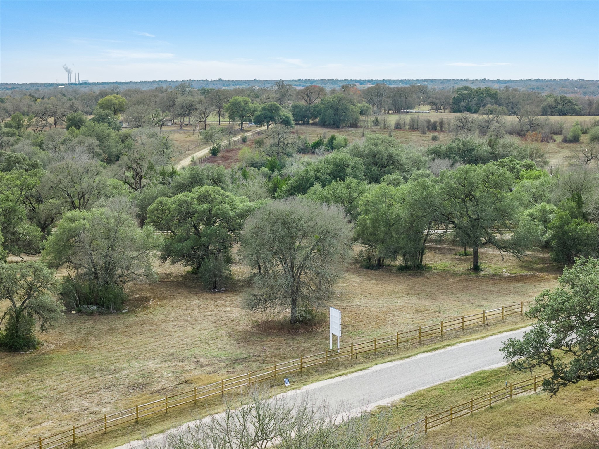 110 Drake Lane Round Top, TX 78954 - Photo 26 of 32 an aerial view of a house with a yard