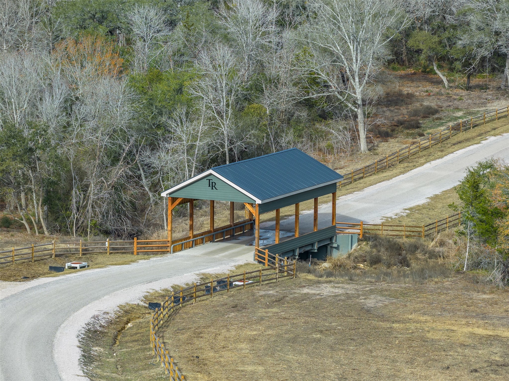 110 Drake Lane Round Top, TX 78954 - Photo 28 of 32 a house view with a outdoor space