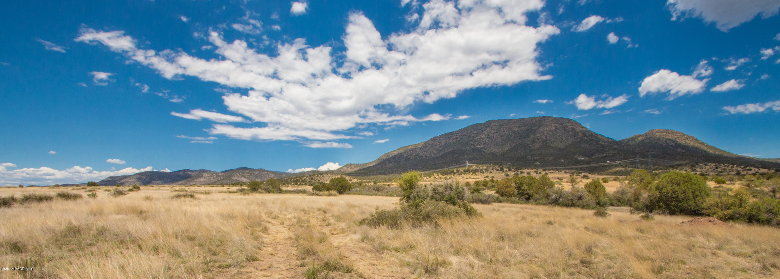 B5 Hydro Ridge Road Prescott Valley, AZ 86315 - Photo 6 of 19 a view of a lake with a mountain