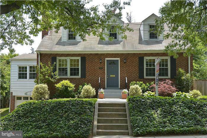 1900 Rookwood Road Silver Spring, MD 20910 - Photo 1 of 30 front view of a house with a yard