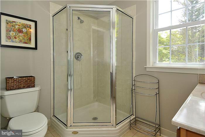 1900 Rookwood Road Silver Spring, MD 20910 - Photo 15 of 30 a bathroom with a toilet and a shower