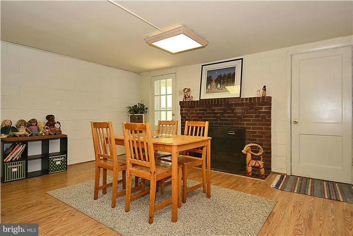 1900 Rookwood Road Silver Spring, MD 20910 - Photo 19 of 30 a dining room with furniture and wooden floor