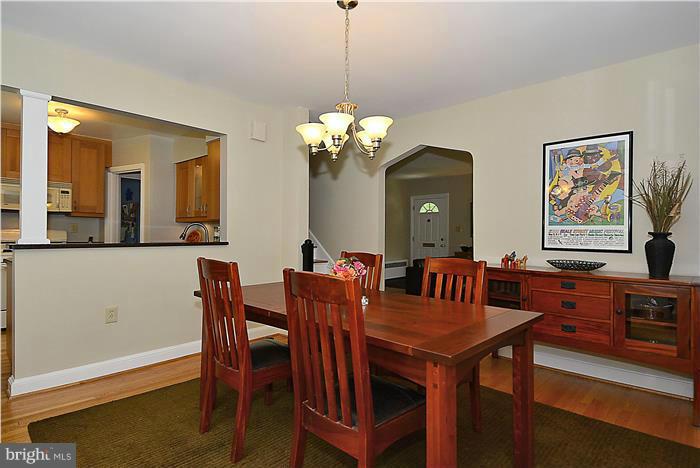 1900 Rookwood Road Silver Spring, MD 20910 - Photo 5 of 30 a view of a dining room with furniture and chandelier
