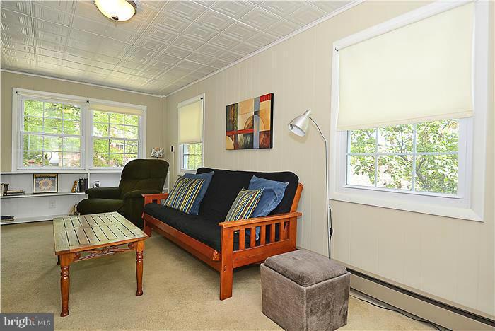 1900 Rookwood Road Silver Spring, MD 20910 - Photo 8 of 30 a living room with furniture and a window