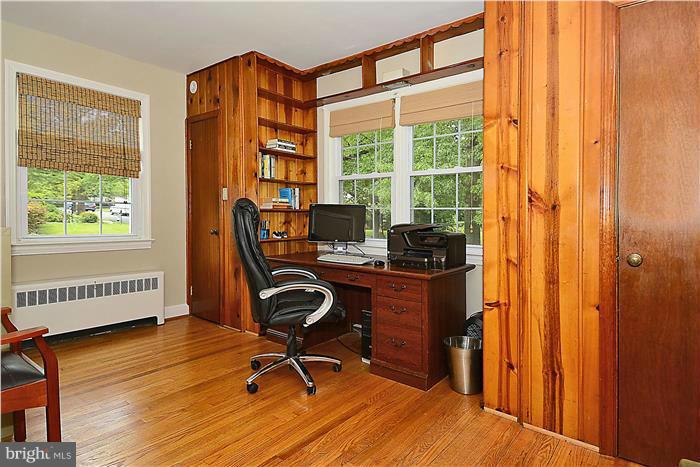 1900 Rookwood Road Silver Spring, MD 20910 - Photo 10 of 30 a view of a workspace with furniture and a window