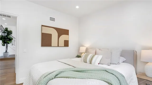 a front view of a house with swimming pool having outdoor seating