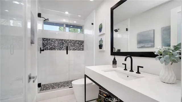 a picture of a room with furniture and air hockey table