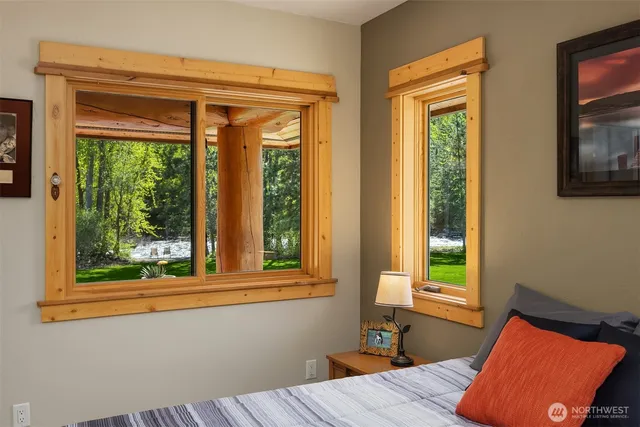 a view of a chair and table in the garden
