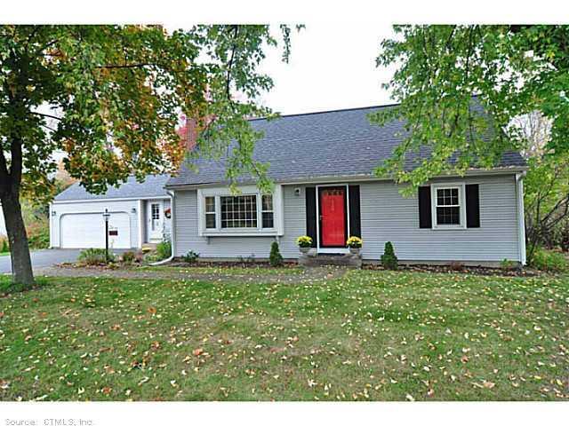 100 West Granby Road Granby, CT 06035 - Photo 1 of 1 a front view of a house with a yard