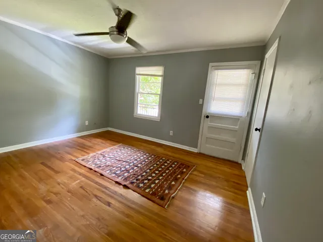 a view of an empty room and window