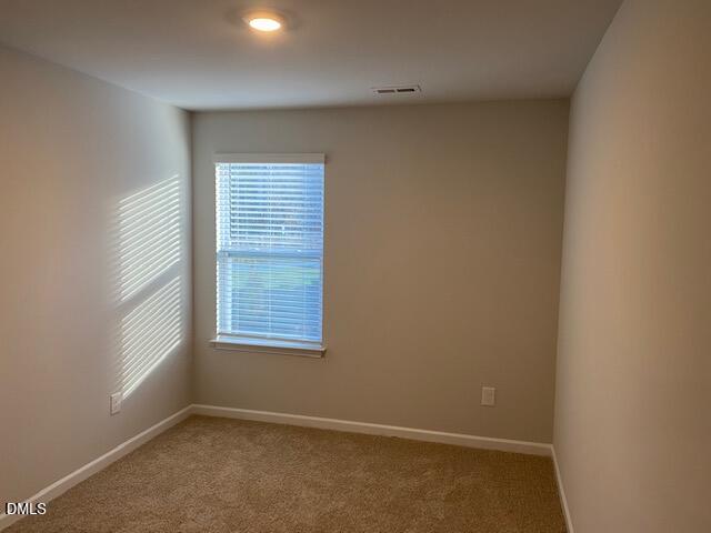 1278 Adrian Court Mebane, NC 27302 - Photo 11 of 33 an empty room with a window