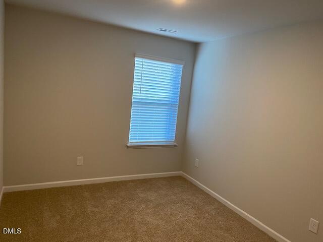 1278 Adrian Court Mebane, NC 27302 - Photo 12 of 33 a view of an empty room with a window