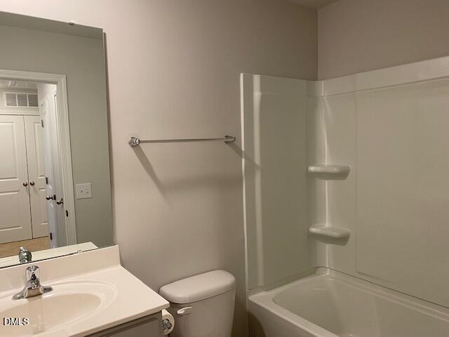 1278 Adrian Court Mebane, NC 27302 - Photo 13 of 33 a bathroom with a sink a toilet and shower