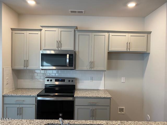 1278 Adrian Court Mebane, NC 27302 - Photo 22 of 33 a kitchen with cabinets and appliances