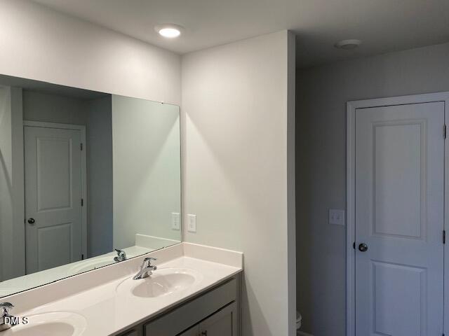 1278 Adrian Court Mebane, NC 27302 - Photo 6 of 33 a bathroom with a sink and a mirror