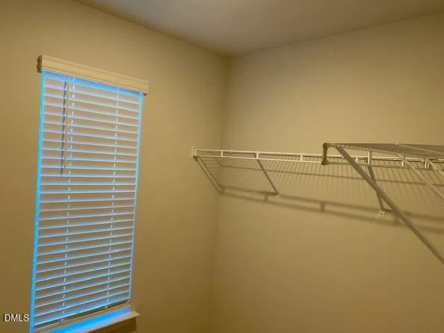 a view of a room with racks on the wall