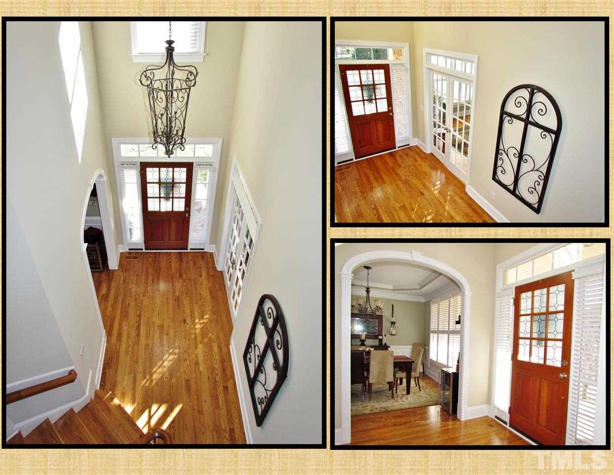 3810 Congeniality Way Raleigh, NC 27613 - Photo 2 of 25 Deep 2 story foyer ushers you into this elegant well finished home. An office/study is behind the french doors and the dining room is through the arched doorway.