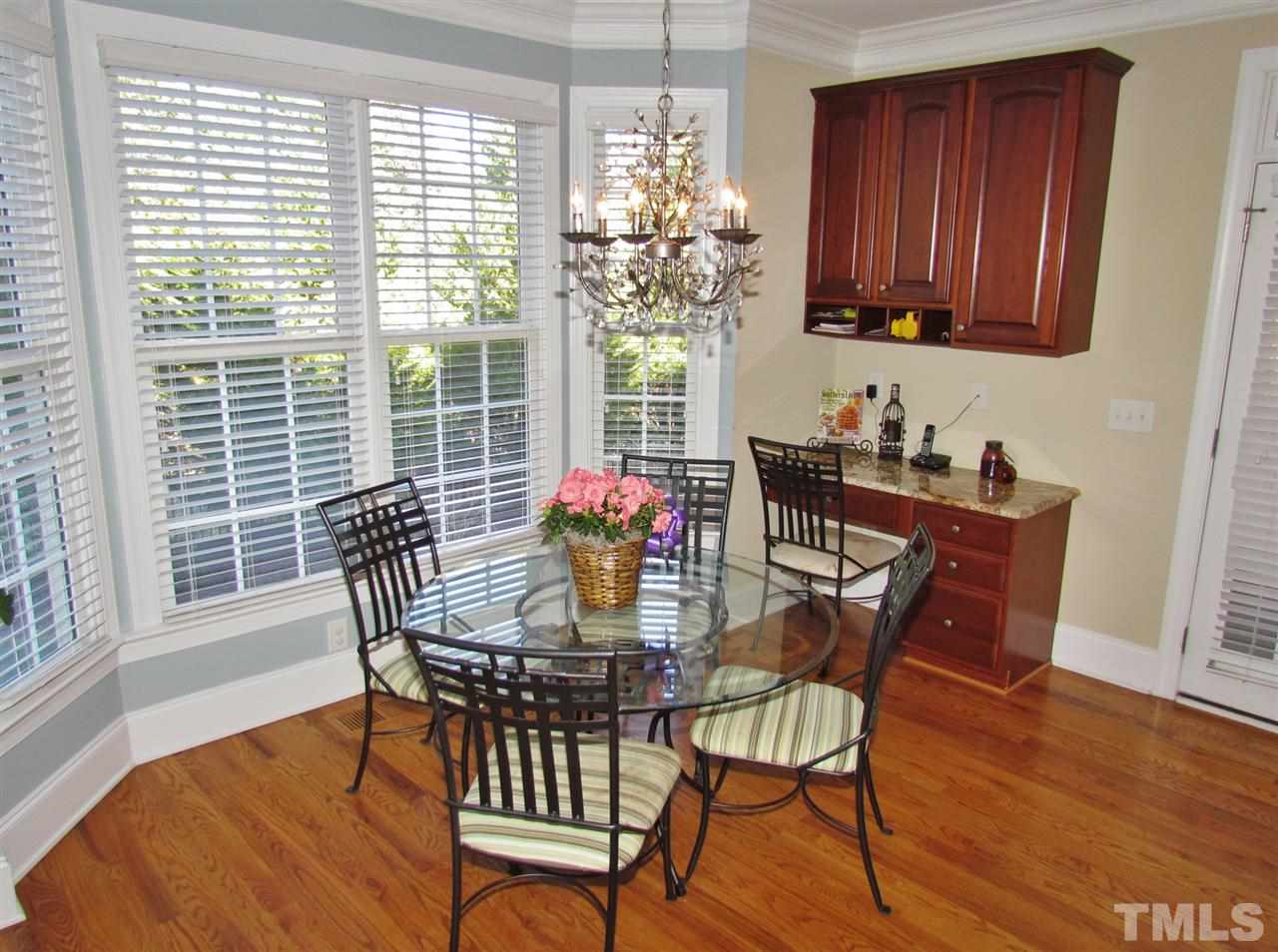 3810 Congeniality Way Raleigh, NC 27613 - Photo 12 of 25 What a welcoming place. Light filled and great spot to re-nourish. Note blinds and built-in desk.