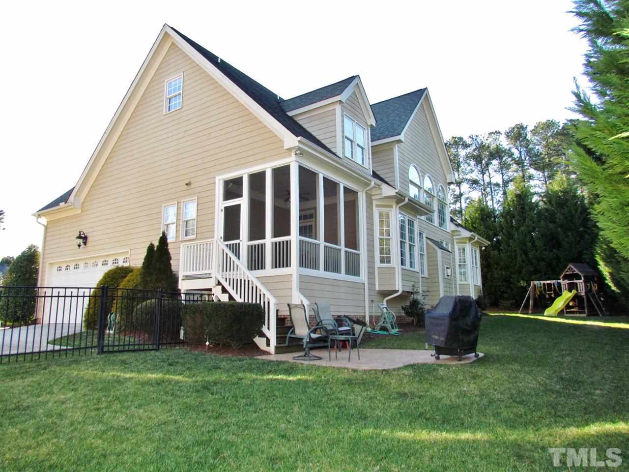 3810 Congeniality Way Raleigh, NC 27613 - Photo 25 of 25 View of rear yard. Note elegant wrought iron look metal fence. Yard has irrigation front and back.