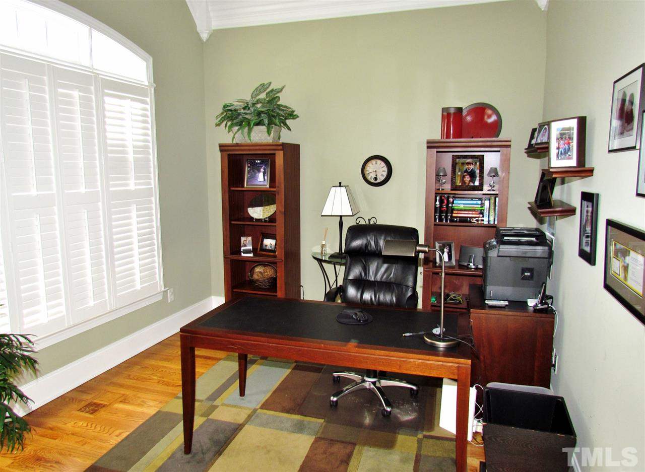 3810 Congeniality Way Raleigh, NC 27613 - Photo 5 of 25 Versatile room just off foyer w cathedral ceiling gives many options. Notice the quality window treatments!
