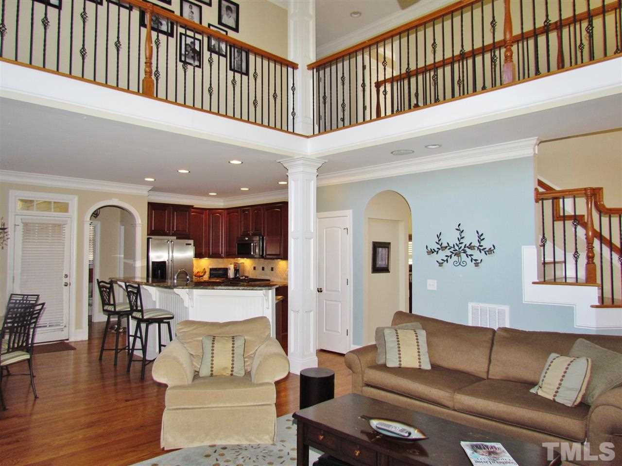 3810 Congeniality Way Raleigh, NC 27613 - Photo 8 of 25 Another view of the family room looking toward the kitchen. Note the detail and the amount of beautiful quality trimwork!