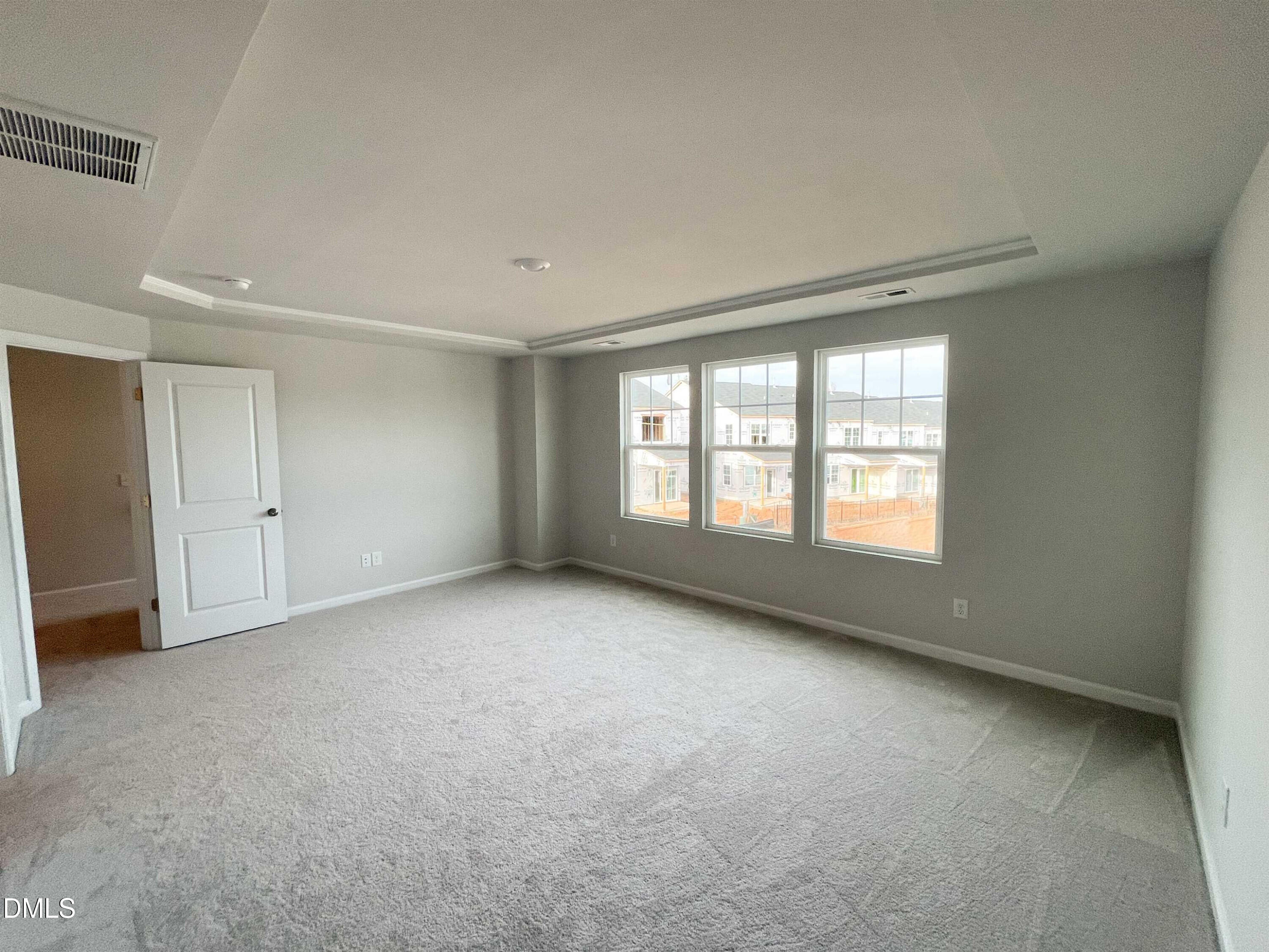 6525 Mezzo Lane Raleigh, NC 27616 - Photo 22 of 38 a view of an empty room with a window
